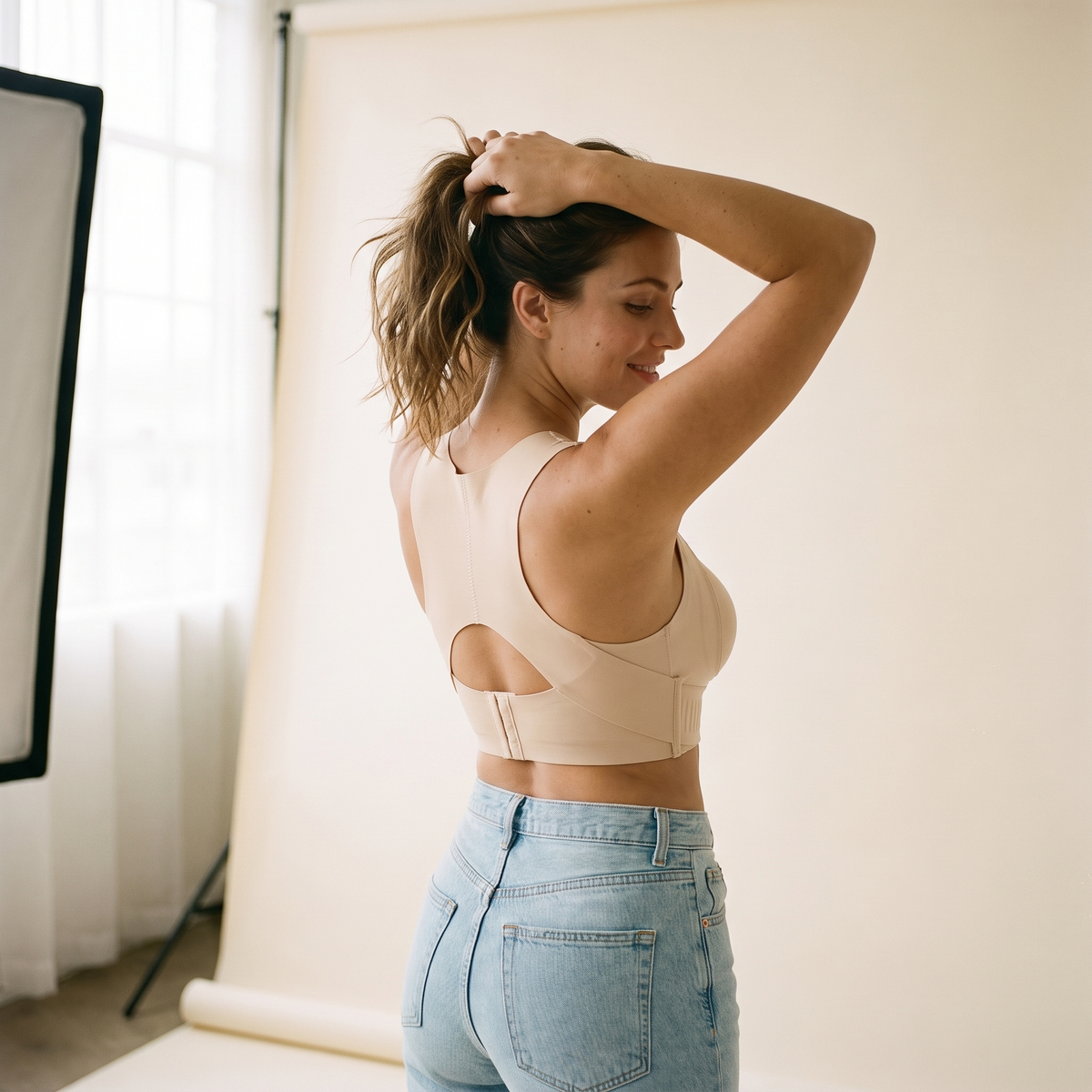 A woman standing tall in side profile